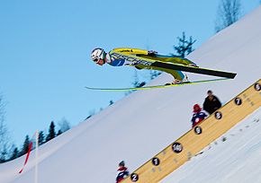 Simon Ammann flying down the hill in Vikersund , 2011

